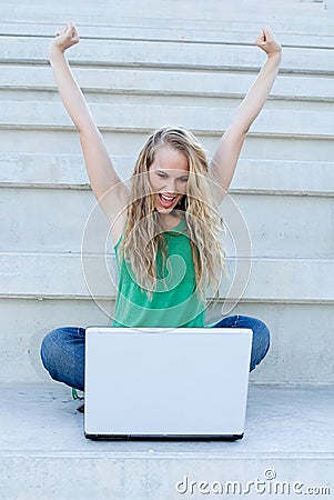 Successful woman with laptop Stock Photo