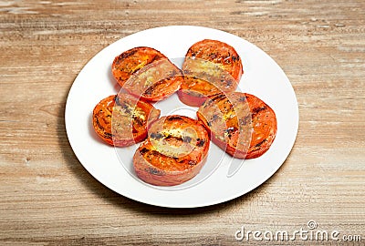 Succulent grilled cherry tomatoes Stock Photo