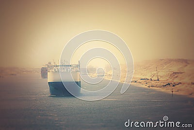 The Suez Canal - a ship convoy passes through the new eastern ex Stock Photo