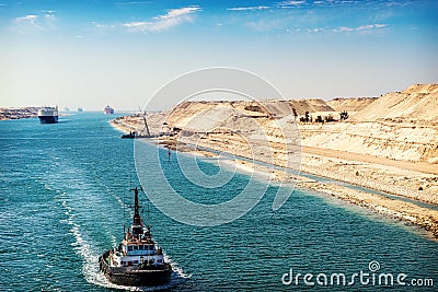 The Suez Canal - a ship convoy passes through the new eastern ex Stock Photo