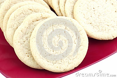 Sugar Cookies on Red Plate Stock Photo