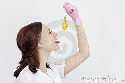 Sugar depilation cosmetic procedure shugaring beautiful girl master holds sugar paste in hands Stock Photo
