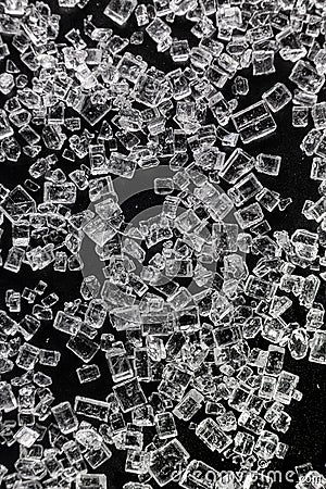 Sugar micro crystals shooted on a black - macro Stock Photo