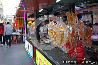 Sugar painting is a traditional snack with strong artistic flavor Editorial Stock Photo