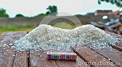 sugar text writing colorful,colorful text writing on wooden background letter sugar,sugar Stock Photo