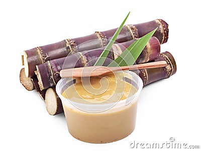 Sugarcane Hard Molasses or Jaggery and sugar isolated Stock Photo