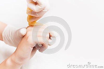 Sugaring epilation skin care with liquid sugar at fingers, hand Stock Photo