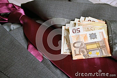 Suit and euro notes Stock Photo