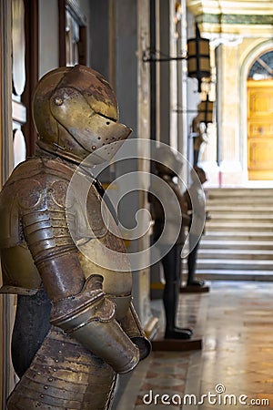 The suits of armour in the Grandmaster`s Palace. Valletta. Malta Editorial Stock Photo