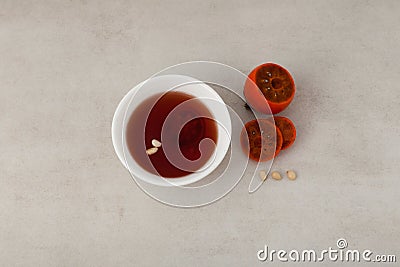 Sujeonggwa - Korean cold fruit tea or chilled punch. Top view, selective focus, copy space Stock Photo