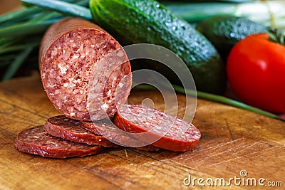 Sujuk sausage on cutting board Stock Photo