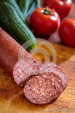 Sujuk sausage on cutting board Stock Photo