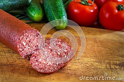 Sujuk sausage on cutting board Stock Photo