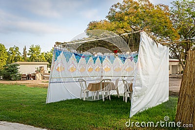 Sukkah - symbolic temporary hut for celebration of Jewish Holiday Sukkot Stock Photo