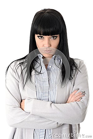 Sulking Unforgiving Moody Woman with Arms Folded and Attitude Stock Photo