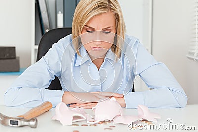 Sulking woman sitting in front Stock Photo