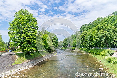 Sumer view on Olza river between Cesky Tesin in Czech Republic and Cieszyn in Poland Stock Photo