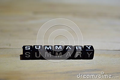 Summary message written on wooden blocks. Stock Photo