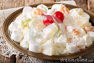 Summer Ambrosia delicious salad of fruits and marshmelow with va Stock Photo
