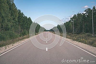 summer asphalt road in perspective - vintage retro look Stock Photo