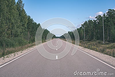 summer asphalt road in perspective - vintage retro look Stock Photo