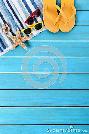 Summer beach background, sunglasses, flip flops, starfish, copy space, vertical Stock Photo