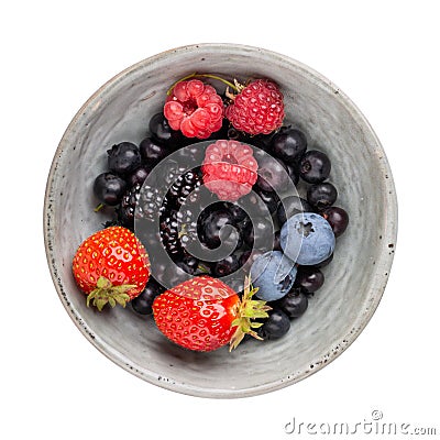 Summer berries bilberry, blueberry, strawberry and raspberry in gray ceramic bowl isolated on white. Top view. Stock Photo