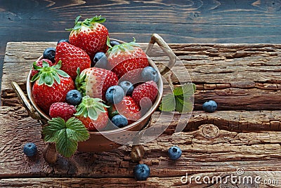 Summer berries in bowl Stock Photo