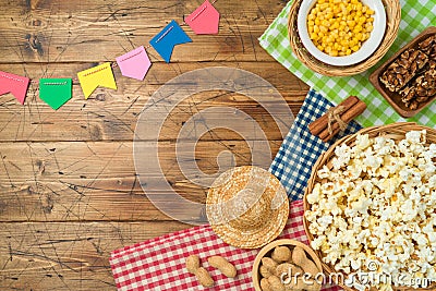 Summer Brazilian harvest festival flat lay background. Festa Junina party with traditional Brazilian food Stock Photo