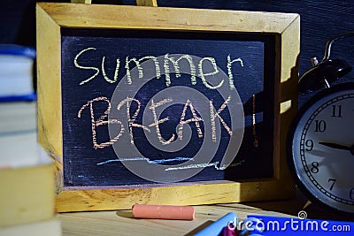 Summer break on phrase colorful handwritten on blackboard Stock Photo