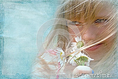 little girl smelling daisy bouquet Stock Photo