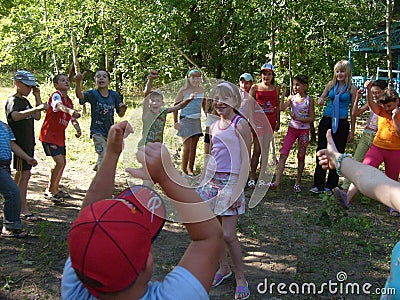 Summer children`s camp, sports games, teenage friendship, forest air, sports. Editorial Stock Photo