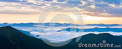 Summer cloudy sunrise mountain panorama Stock Photo