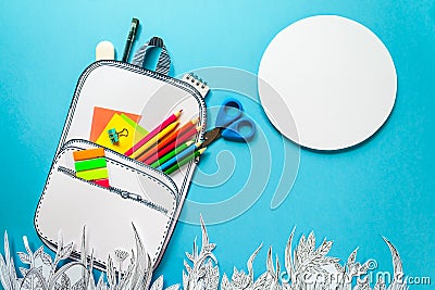 Summer concept, school backpack on graphic grass, made of paper, frame Stock Photo