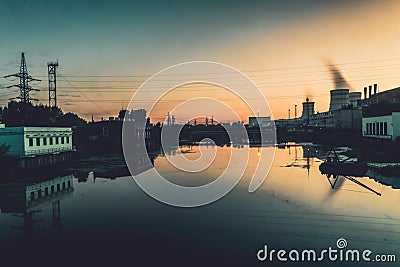 Dawn on the river plant hydroelectric stations Stock Photo