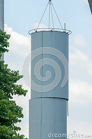 Summer day dismantling a water tower in Ann Arbor, Michigan Stock Photo