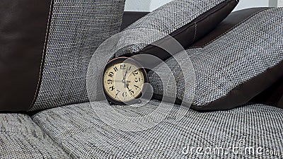 Summer Daylight Saving Time DST. Blue sky with yellow dandelions. Turn time forward +1h Stock Photo