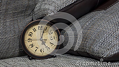 Summer Daylight Saving Time DST. Blue sky with yellow dandelions. Turn time forward +1h Stock Photo