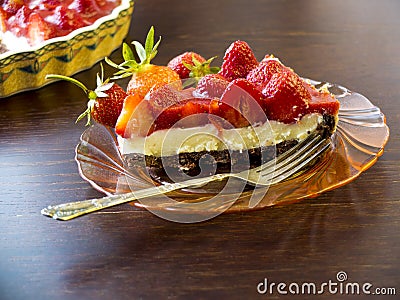 Summer dessert - strawberry tart cake with cream filling and baking mold Stock Photo