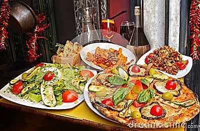 Pasta , pizza and homemade food arrangement in a restaurant Rome Stock Photo