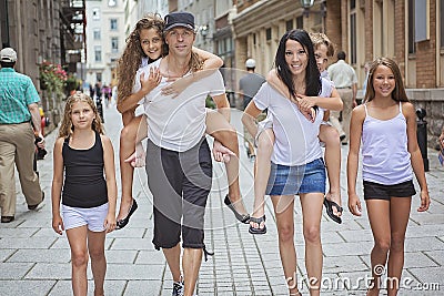 Summer family portrait of parents and kids outside Stock Photo