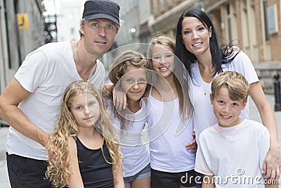 Summer family portrait of parents and kids outside Stock Photo