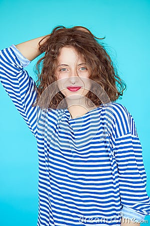 Summer fashion girl with curly hairstyle and striped shirt Stock Photo