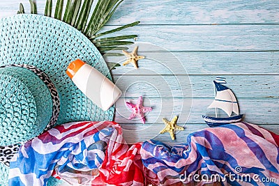 Summer Fashion woman big hat and sunblock with accessories item go to travel in the beach. Stock Photo