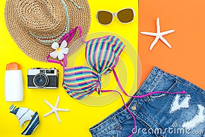 Summer Fashion woman swimsuit Bikini, camera, fish star, sunblock, sun glasses, hat. Stock Photo