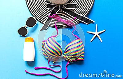 Summer Fashion woman swimsuit Bikini. Tropical sea.Unusual top view, colorful background. Stock Photo