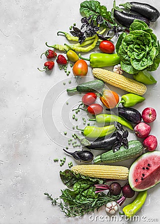 Summer fresh organic vegetables fruits harvest background. Organic garden vegetables, berries, fruit on a light background, top Stock Photo