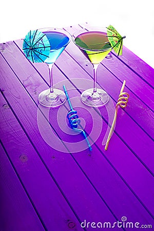 Summer fun vacation. Yellow and blue beach party cocktail drinks Stock Photo