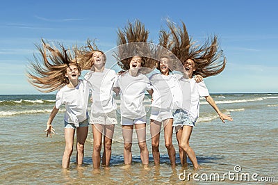 Summer girls playing on Beach Stock Photo