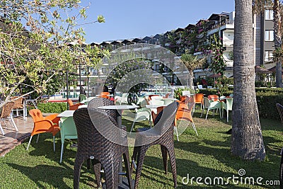 Summer ground with chairs and tables is waiting for visitors Editorial Stock Photo